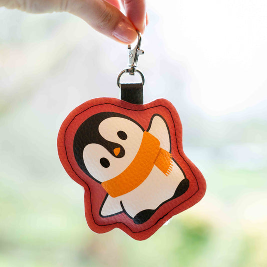 Taschengebömsel Pinguin Schal